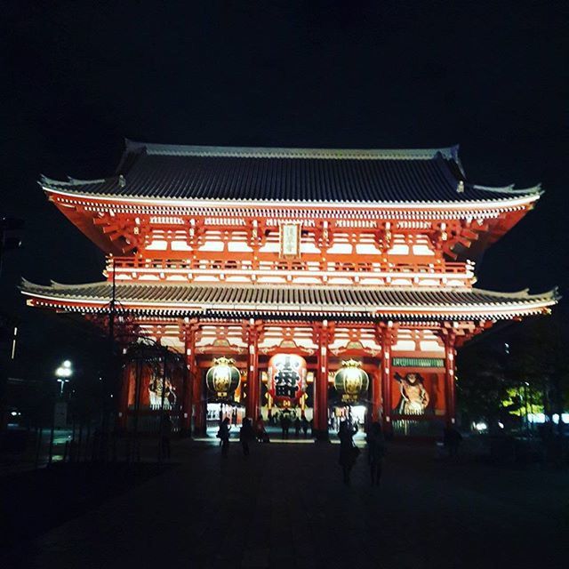 VIEW OF ILLUMINATED TEMPLE AT NIGHT