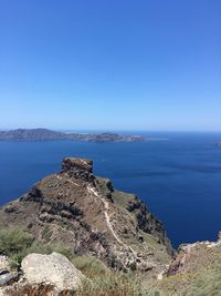 Scenic view of sea against clear blue sky