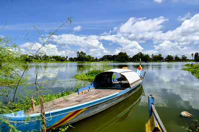 Boat moored in water