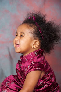 Portrait of smiling girl looking away
