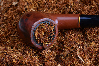 High angle view of coffee cup on ground