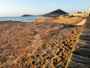 Scenic view of beach against sky