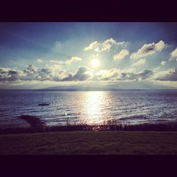 Scenic view of sea at sunset