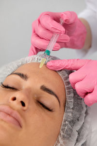 Cropped hand of doctor examining patient