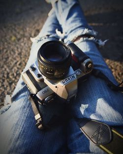 High angle view of camera on wood