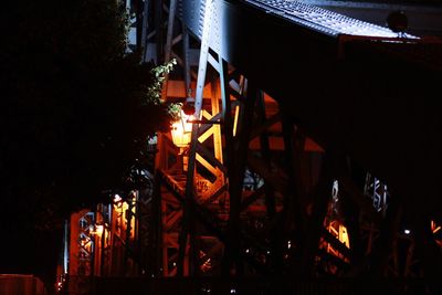 Low angle view of illuminated buildings at night
