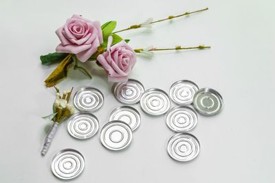 High angle view of rose bouquet on white table