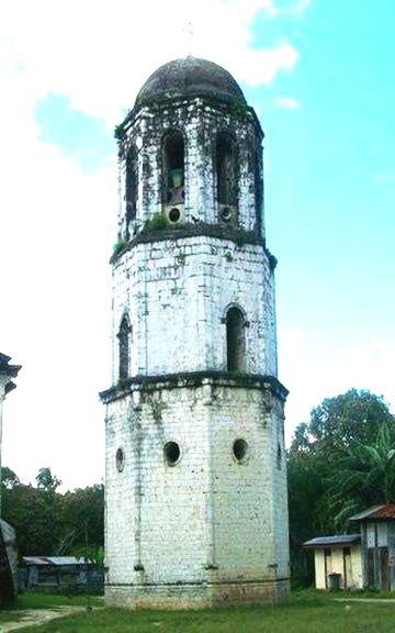 architecture, building exterior, built structure, religion, church, low angle view, place of worship, tower, sky, spirituality, history, tree, clock tower, castle, day, old, outdoors, bell tower