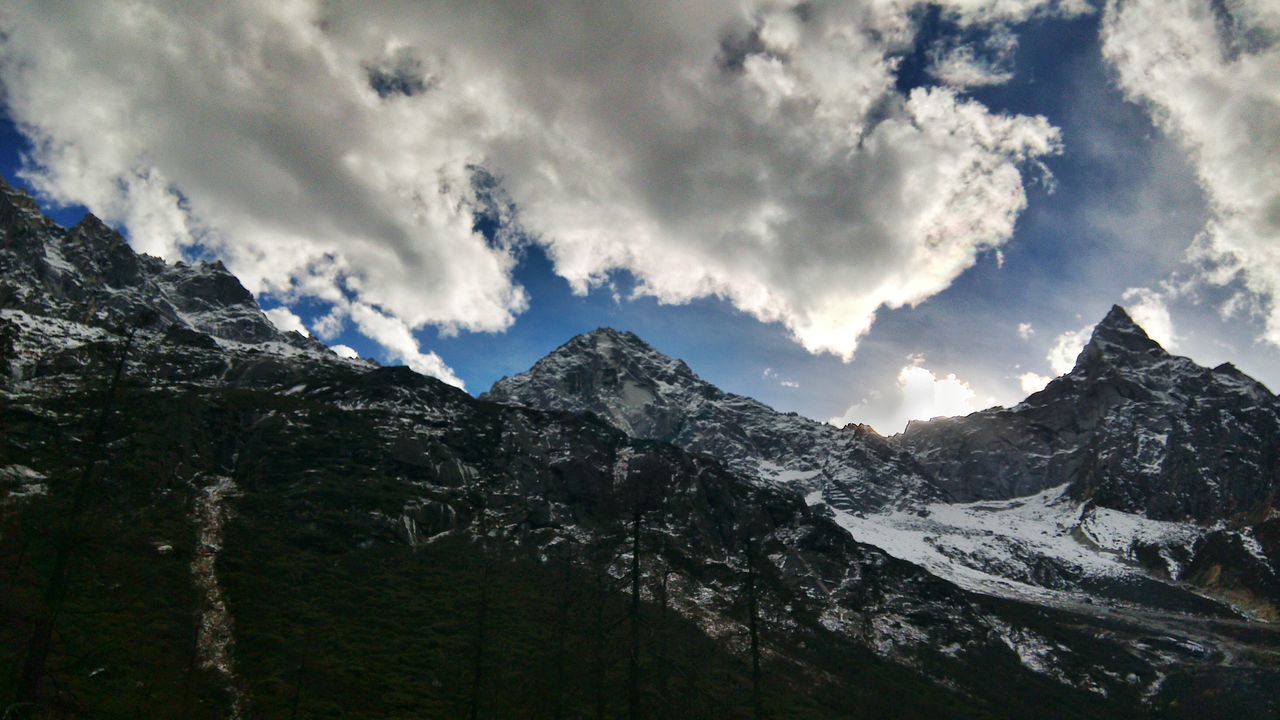 mountain, mountain range, tranquil scene, scenics, tranquility, sky, beauty in nature, snow, cloud - sky, nature, winter, cold temperature, landscape, snowcapped mountain, non-urban scene, idyllic, weather, cloud, cloudy, season