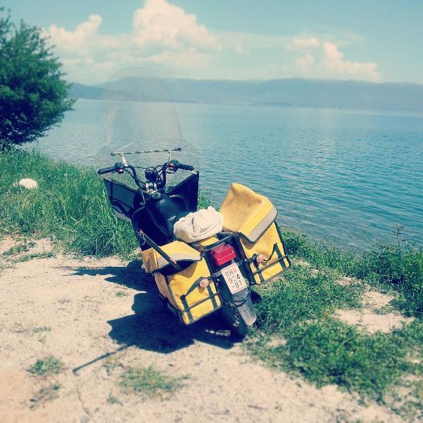 transportation, mode of transport, water, nautical vessel, sea, boat, sky, moored, tranquility, tranquil scene, beach, horizon over water, nature, scenics, shore, beauty in nature, day, sand, grass, travel