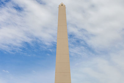 Low angle view of tower against sky in city