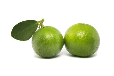 Close-up of lemon against white background