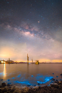 Scenic view of sea against sky at night