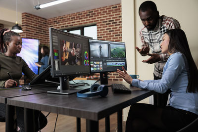 Business colleagues working at office