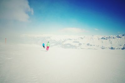 Scenic view of snow covered mountain against sky