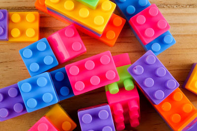Close-up of toy blocks on wooden table
