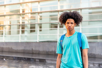 Afro latin male teenager in the city