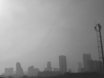 Modern buildings in city against sky
