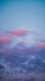 Low angle view of dramatic sky during sunset