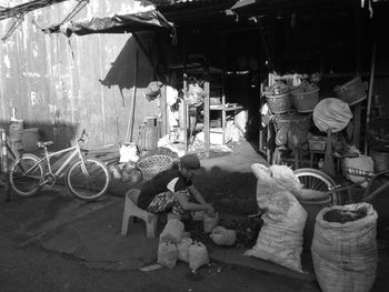 People working at market stall