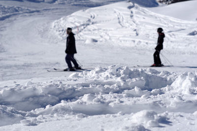 Full length of man on snow covered mountain