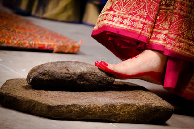 Close-up low section of an indian bride