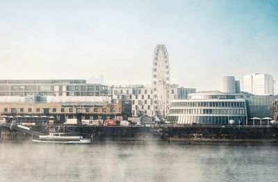 The rheinauhafen and a funfair  in cologne, germany