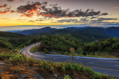 Scenic view of mountains against sky during sunset