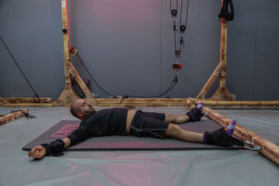 Low angle view of man standing against sky