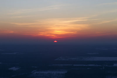 Scenic view of dramatic sky during sunset