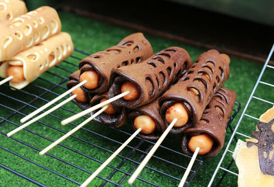 High angle view of meat on barbecue grill