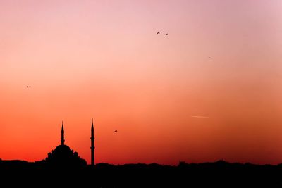 Silhouette of church at sunset