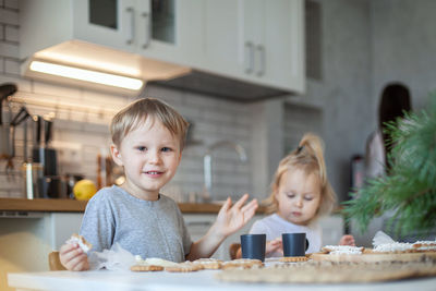 Portrait of cute boy at home