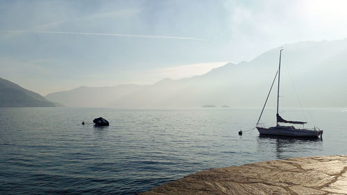 Scenic view of lake maggiore against sky