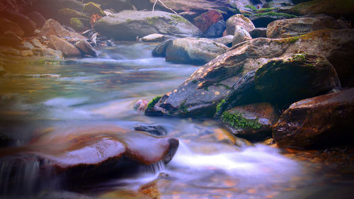 Water flowing through rocks in river