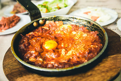 High angle view of shakshouka served in pan