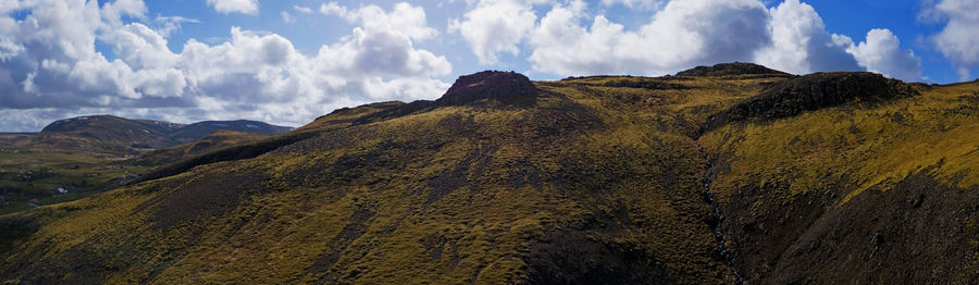 Panoramic view of mountains against sky