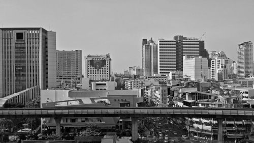 High angle view of buildings against clear sky