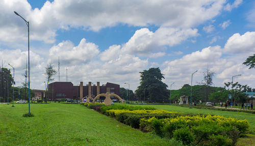 Panoramic shot of trees and buildings against sky