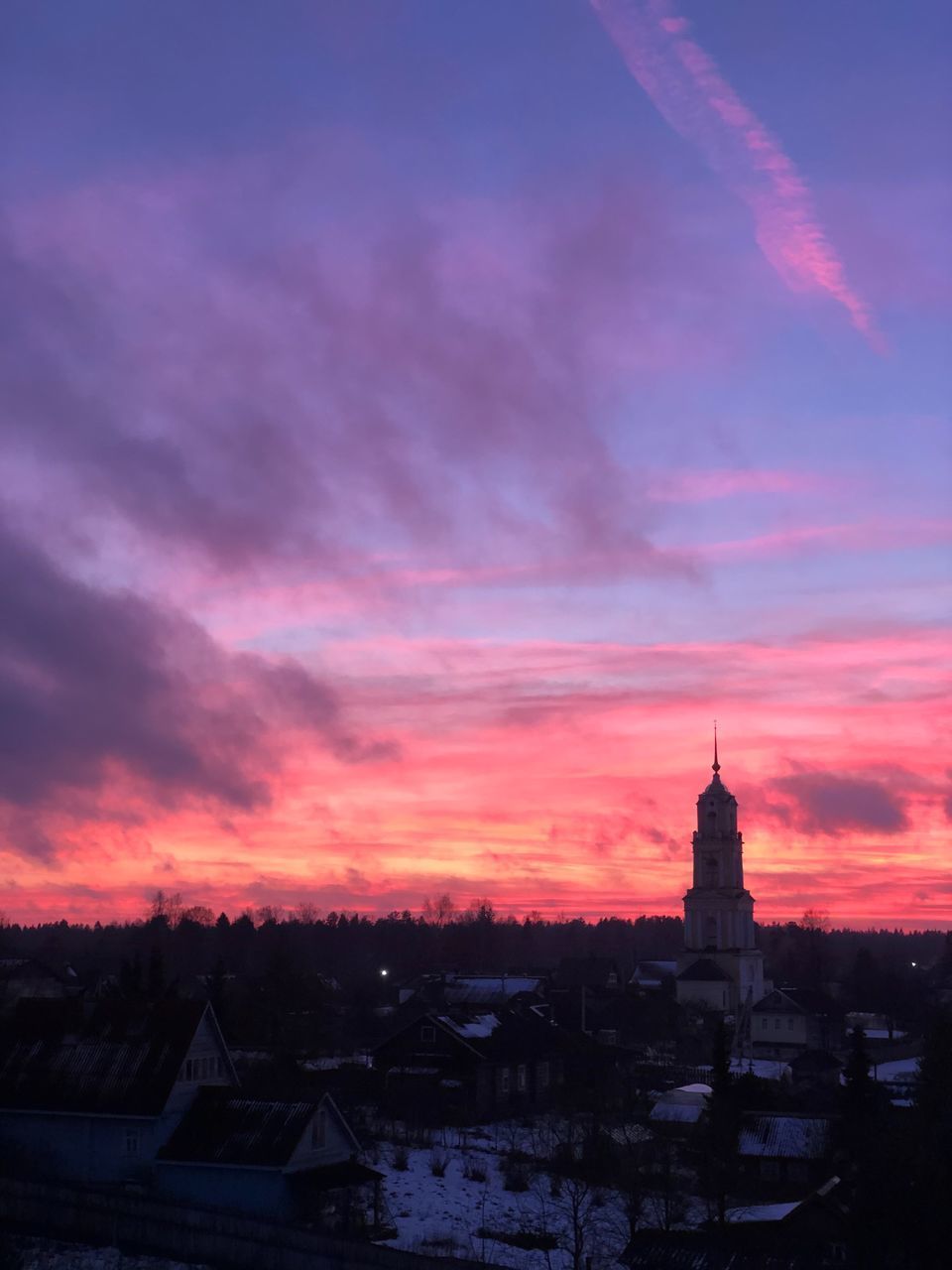 TOWNSCAPE AGAINST SKY DURING SUNSET