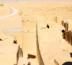 High angle view of people on sand dune