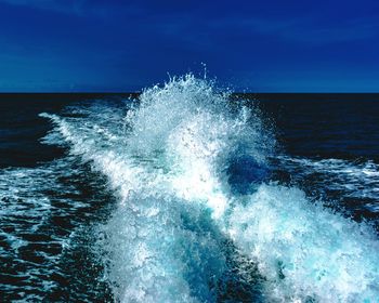 Waves splashing on rocks