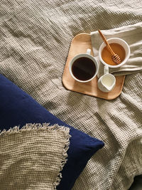 High angle view of coffee cup on table