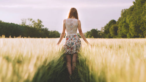 Man standing on grassy field