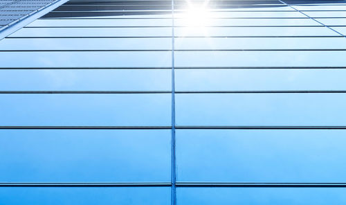 Low angle view of building against blue sky