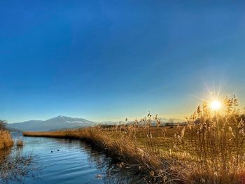 Scenic view of lake against sky