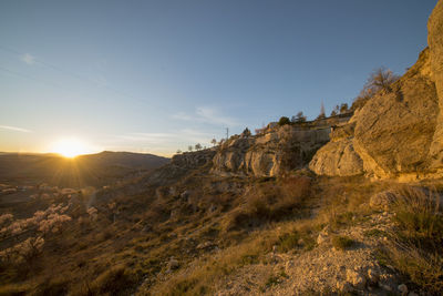 Scenic view of land against clear sky