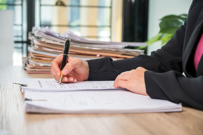 Midsection of man on table