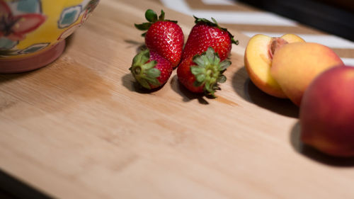 High angle view of strawberries on table