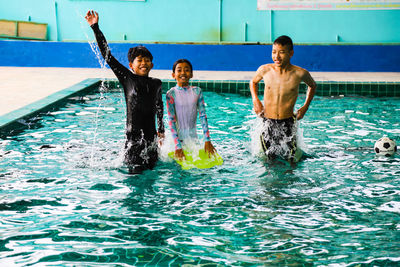 People swimming in pool